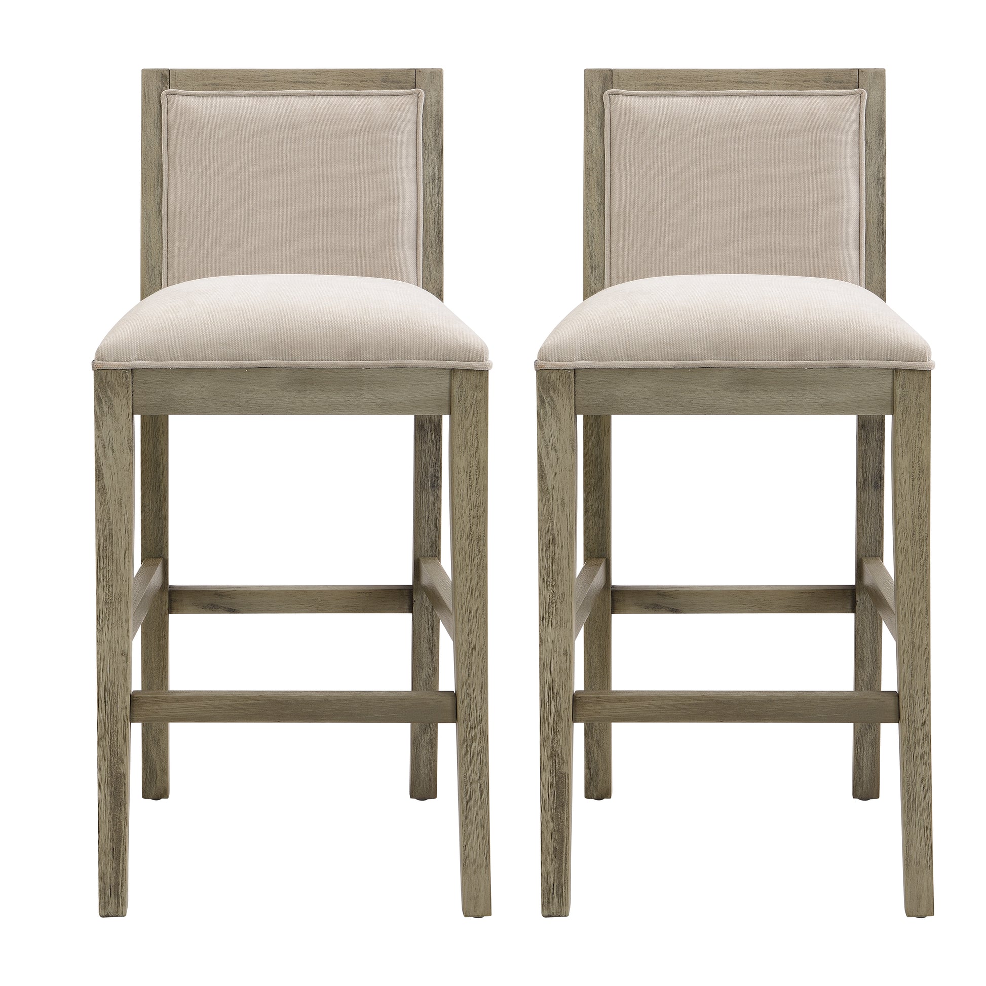 Pair of light beige upholstered counter stools with distressed gray wood frames and footrests