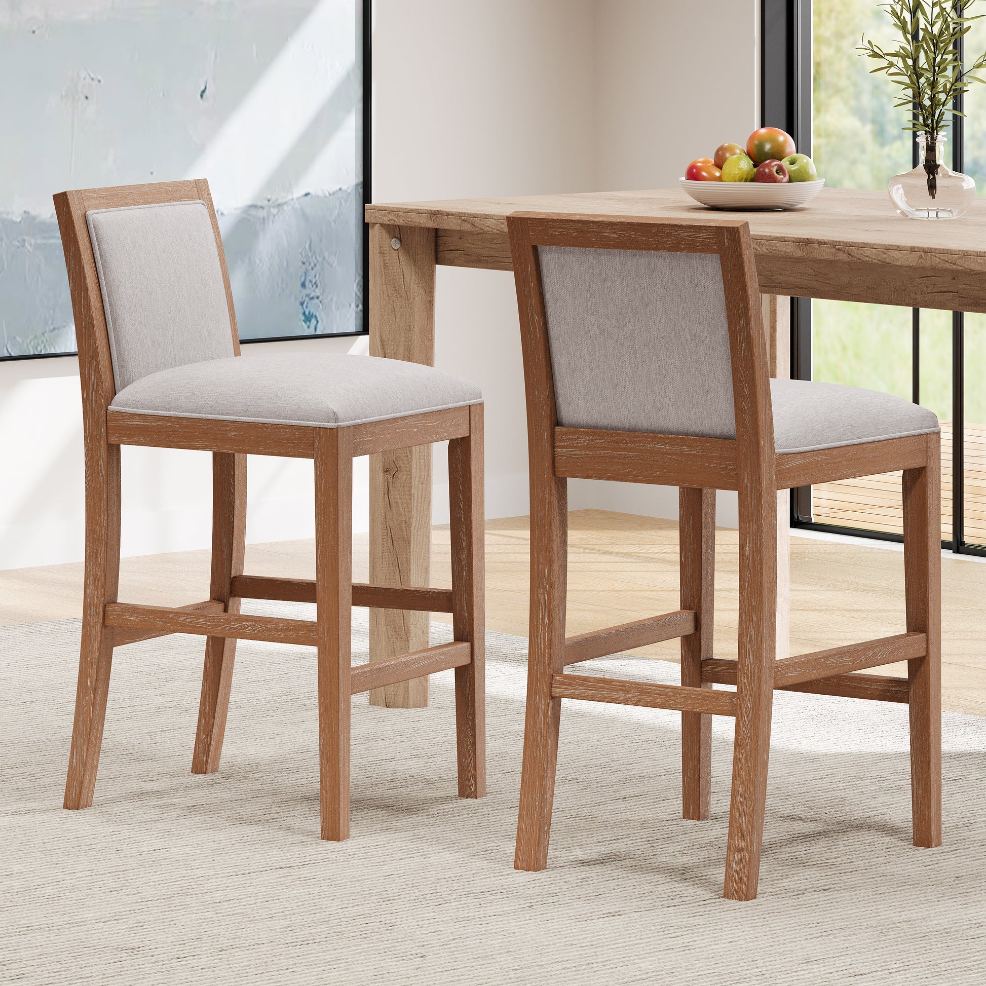 Light gray upholstered wooden counter stool with a distressed oak finish