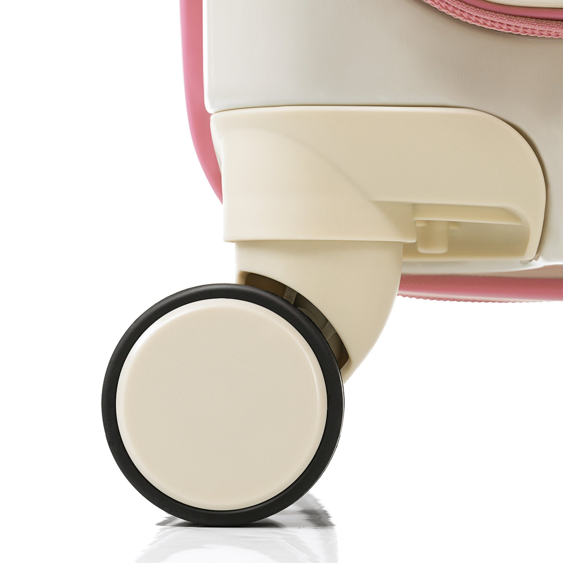 Closeup of a creamcolored suitcase wheel with black trim for easy travel