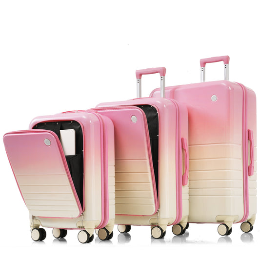 Set of three pink and cream gradient hardshell luggage with pink handles and zippers