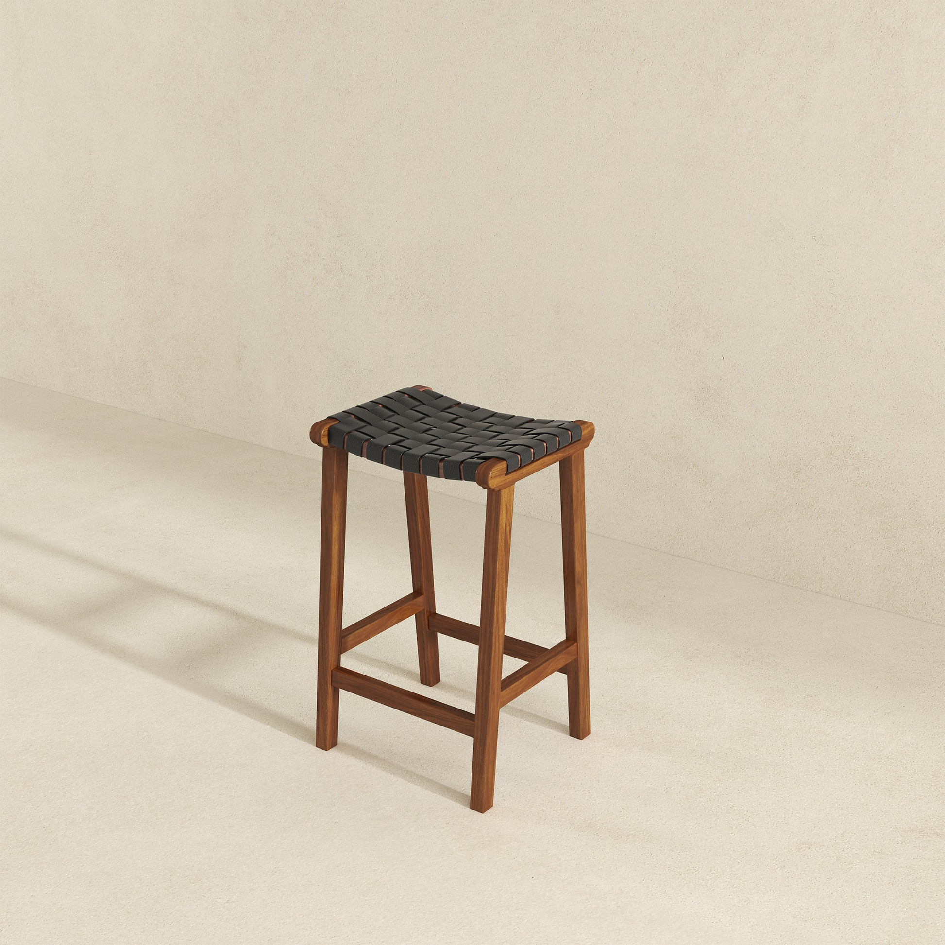 Brown wooden bar stool with woven black seat for modern kitchens