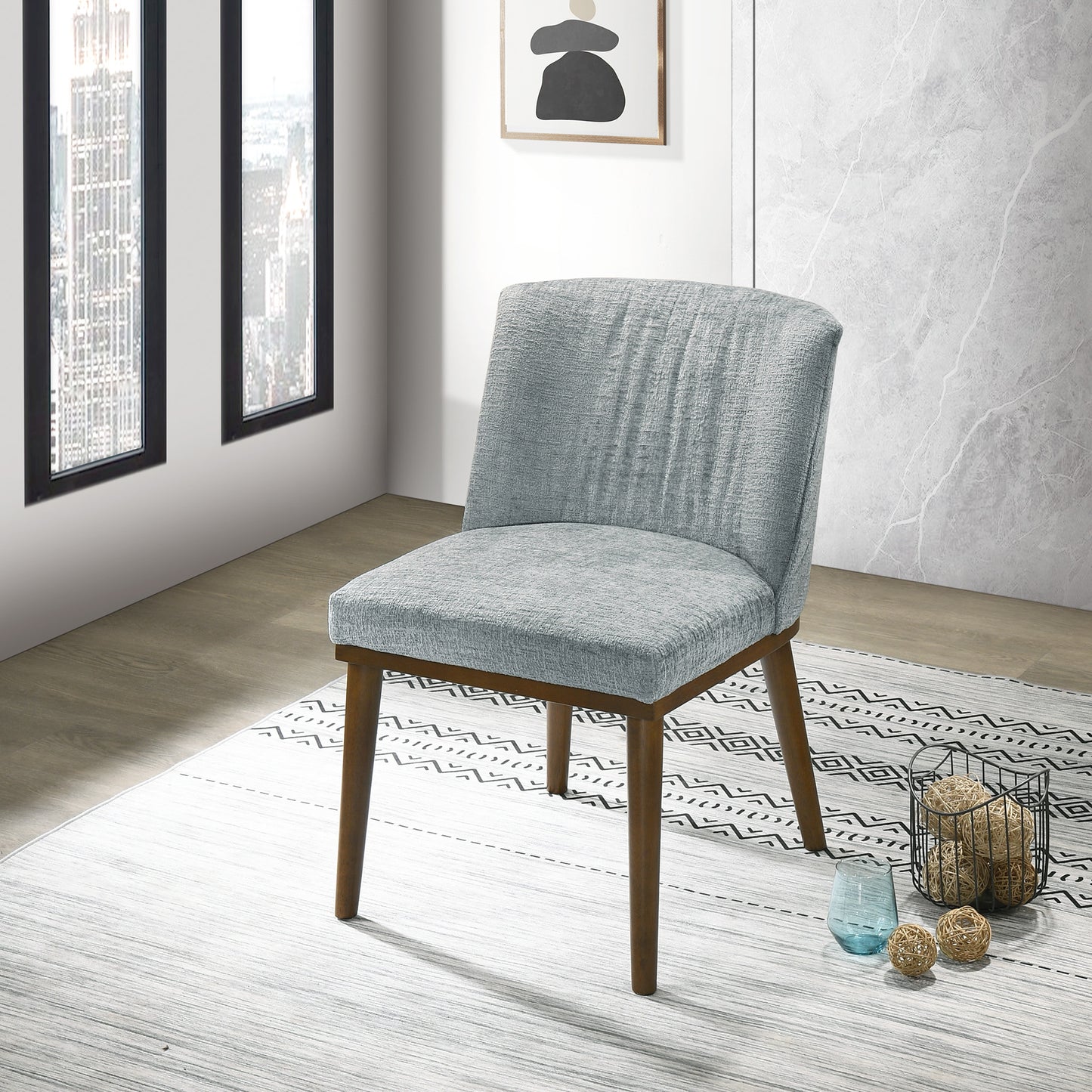 Light blue fabric dining chair with natural wood legs perfect for modern kitchens