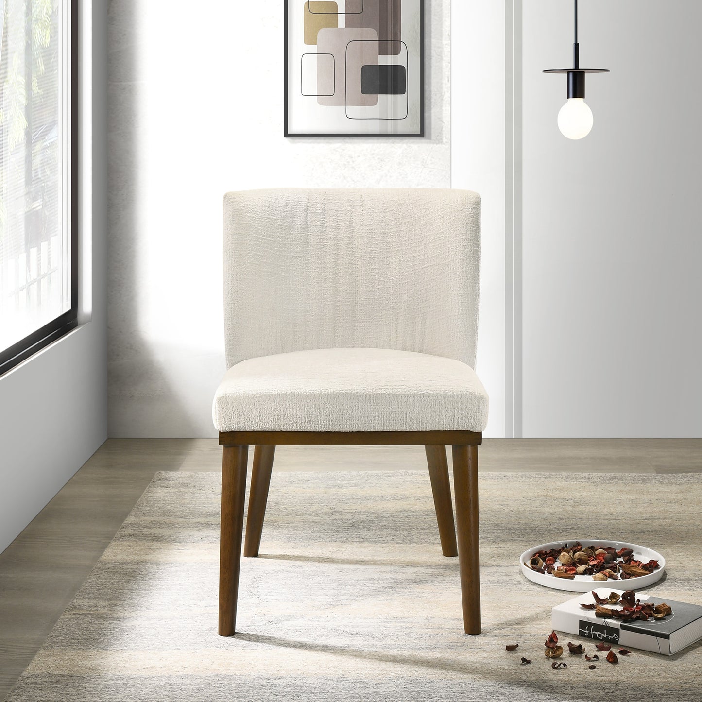 Cream textured accent chair with dark wood legs perfect for modern dining spaces