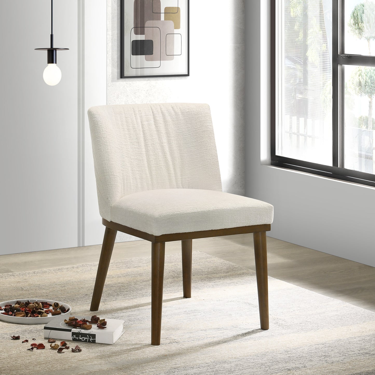 Cream textured upholstered dining chair with tapered wooden legs
