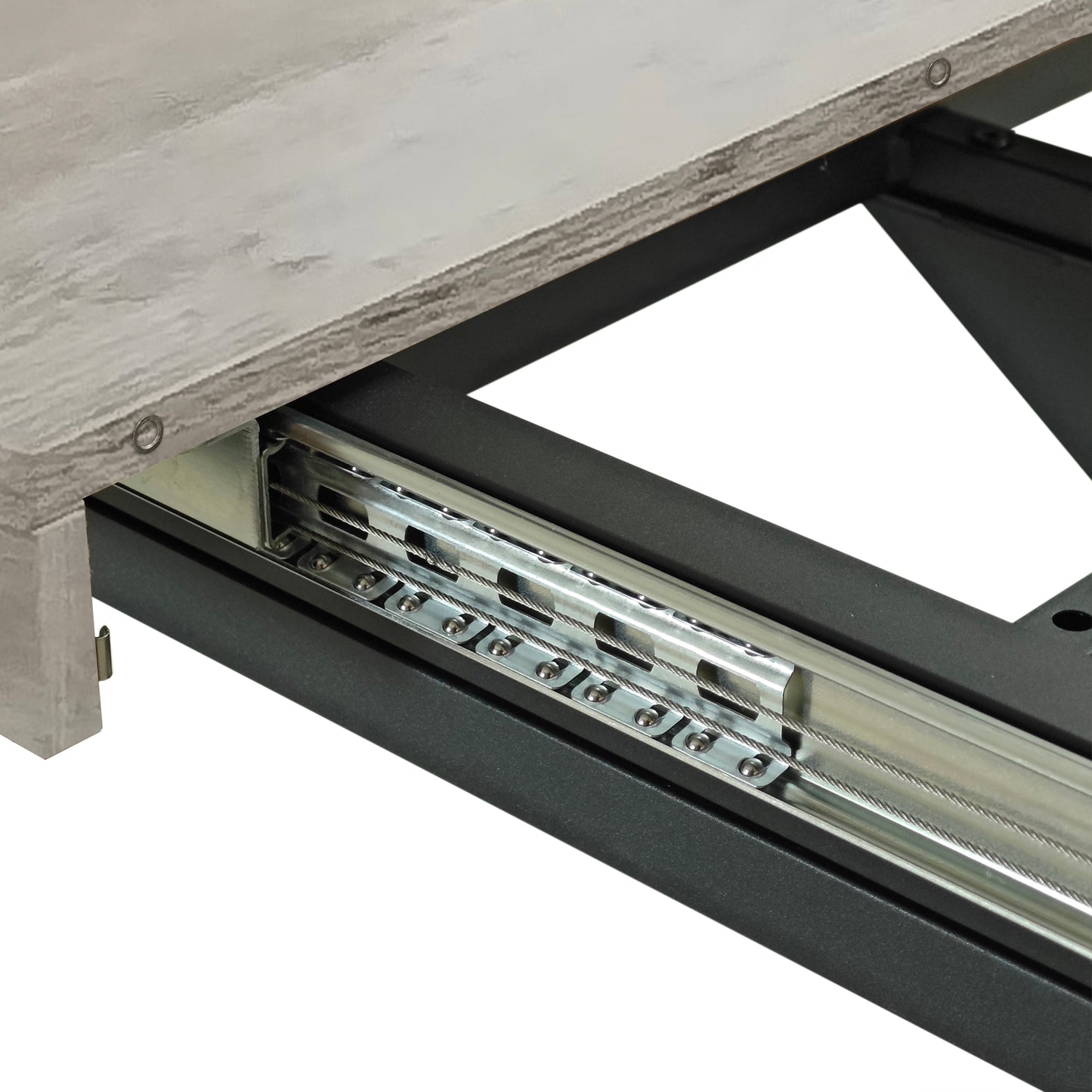 Closeup of extension table mechanism with smooth metal glides and cable support system