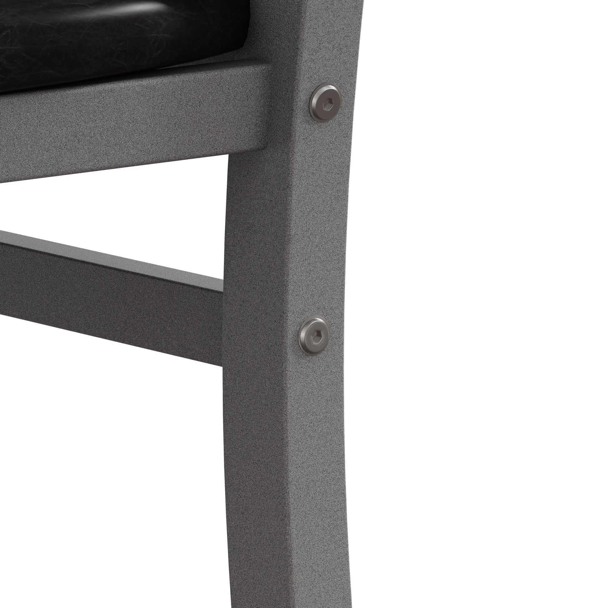 Closeup of black leather seat cushion detail on a speckled grey metal chair frame
