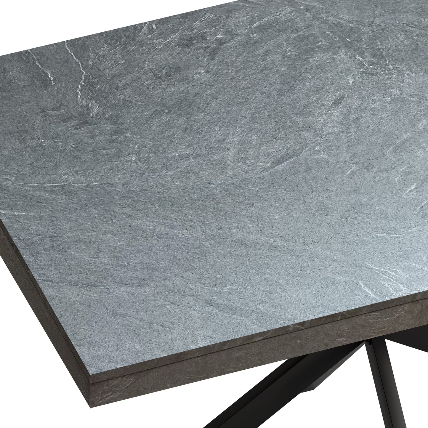 Closeup of a modern dining table with a grey slateeffect ceramic top and black metal legs