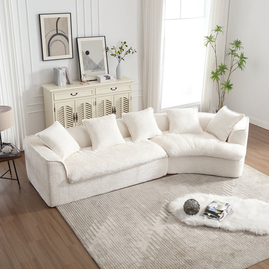 Plush white boucle sectional sofa with multiple cushions perfect for modern living room comfort