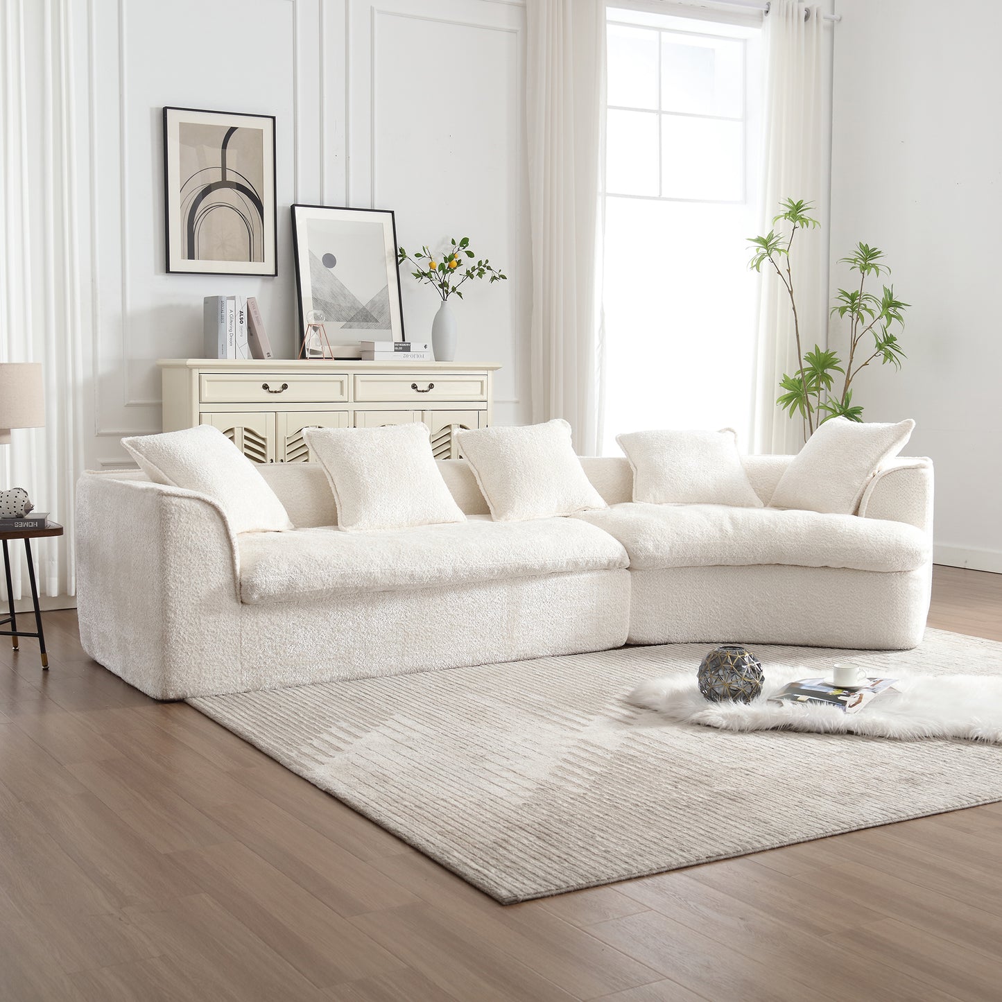 Cozy offwhite boucle sectional sofa with plush throw pillows for a comfortable living room arrangement