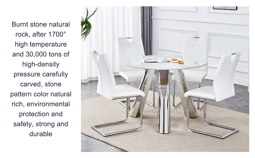 White faux leather dining chairs with chrome legs around a circular white dining table