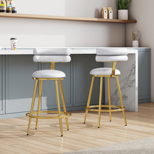 Pair of white upholstered swivel bar stools with gold metal legs and backrests