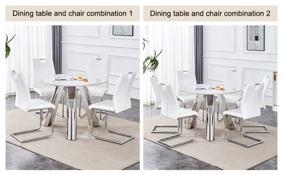 White leather dining chairs with chrome sled legs surround a round white marble top dining table