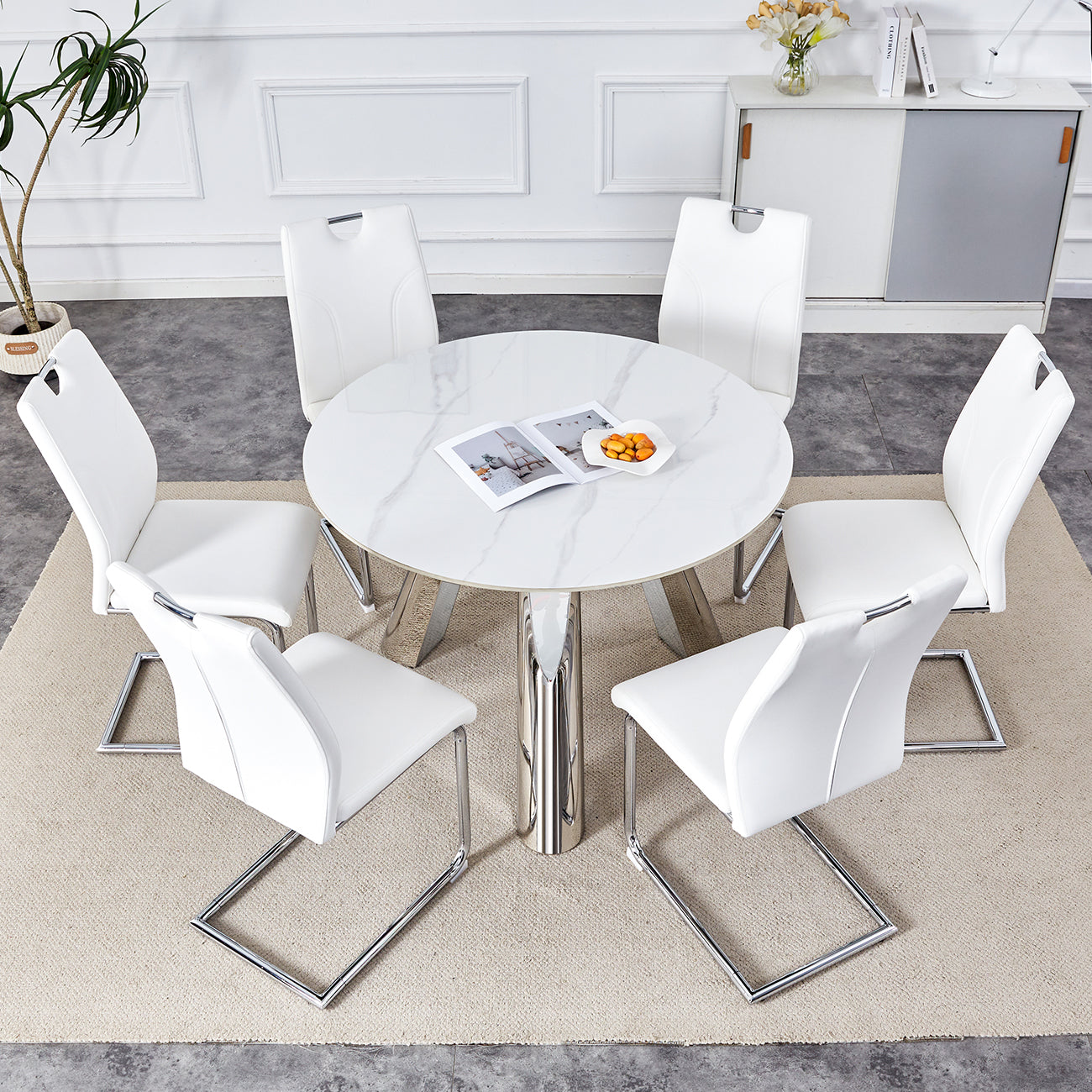Modern white faux leather dining chairs with chrome sled legs
