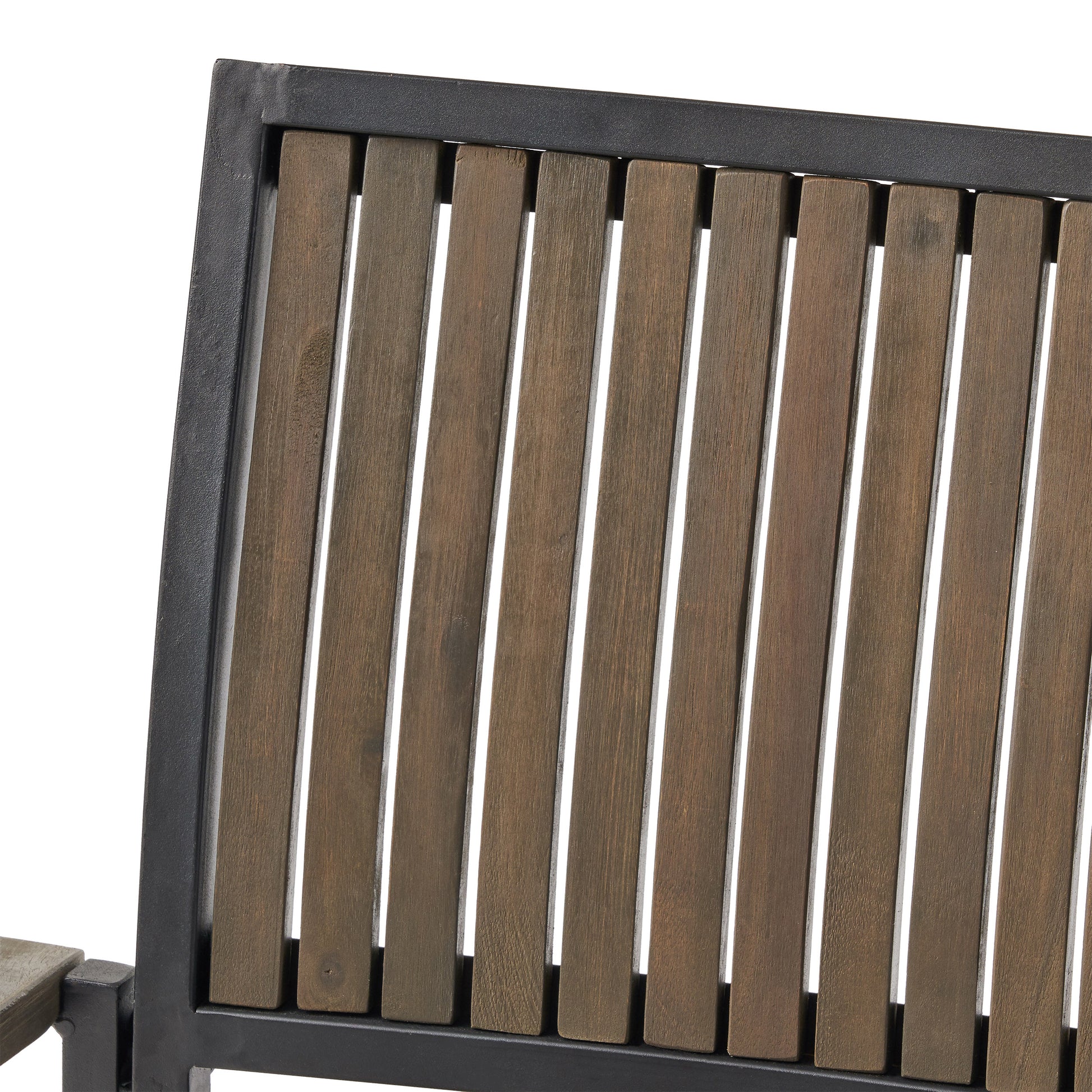 Closeup of weathered wood slats with a dark metal frame ideal for outdoor patio furniture