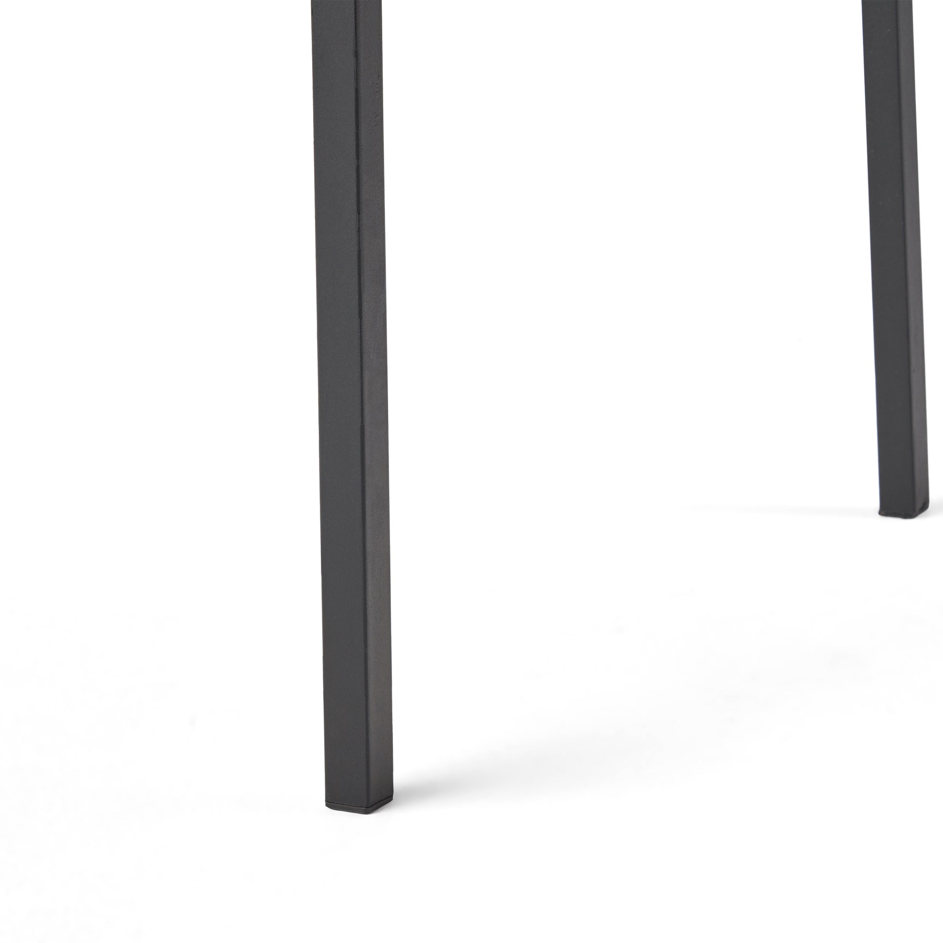 Matte black metal table leg with minimalist design essential for modern furniture
