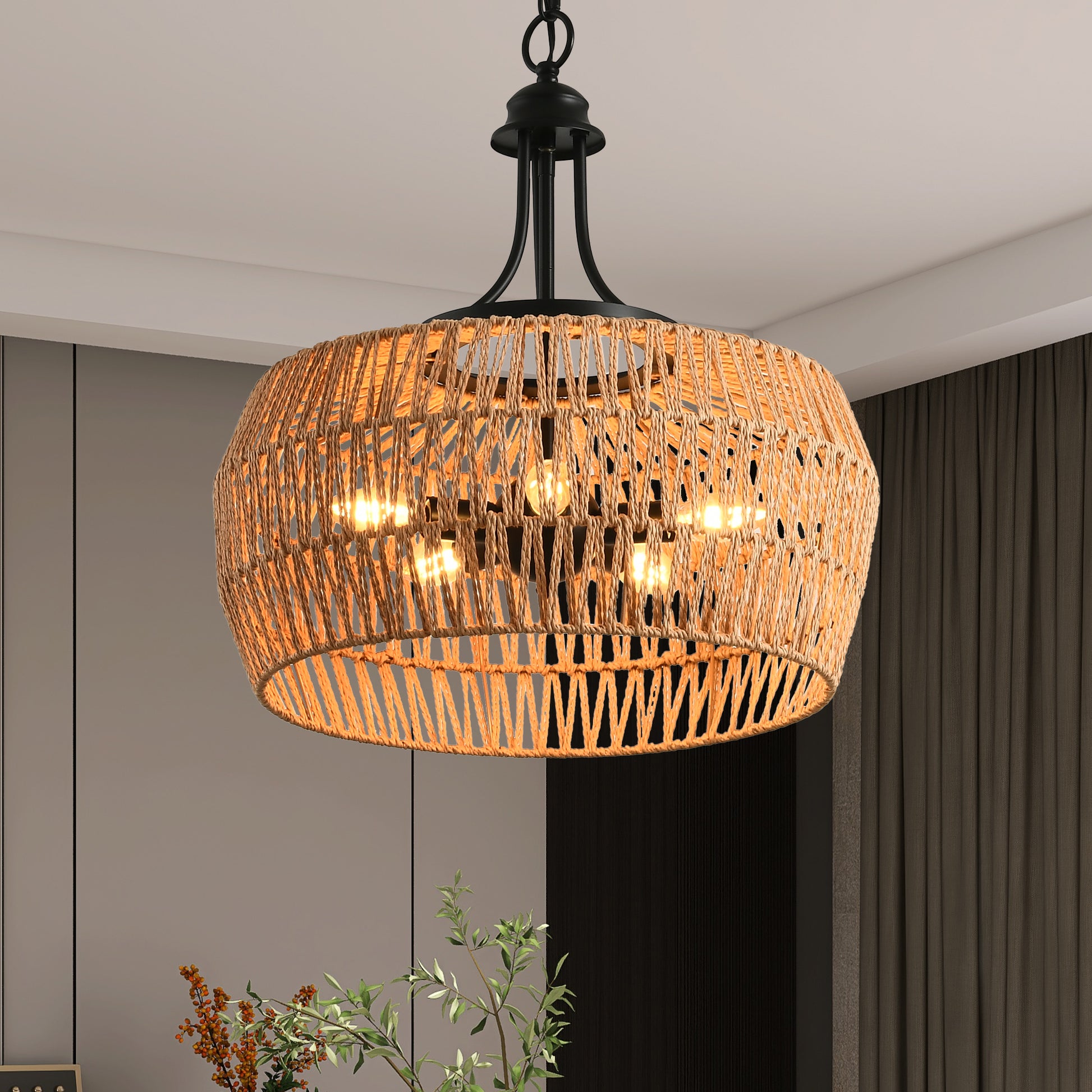 Natural fiber pendant light with a rustic woven design and black metal accents