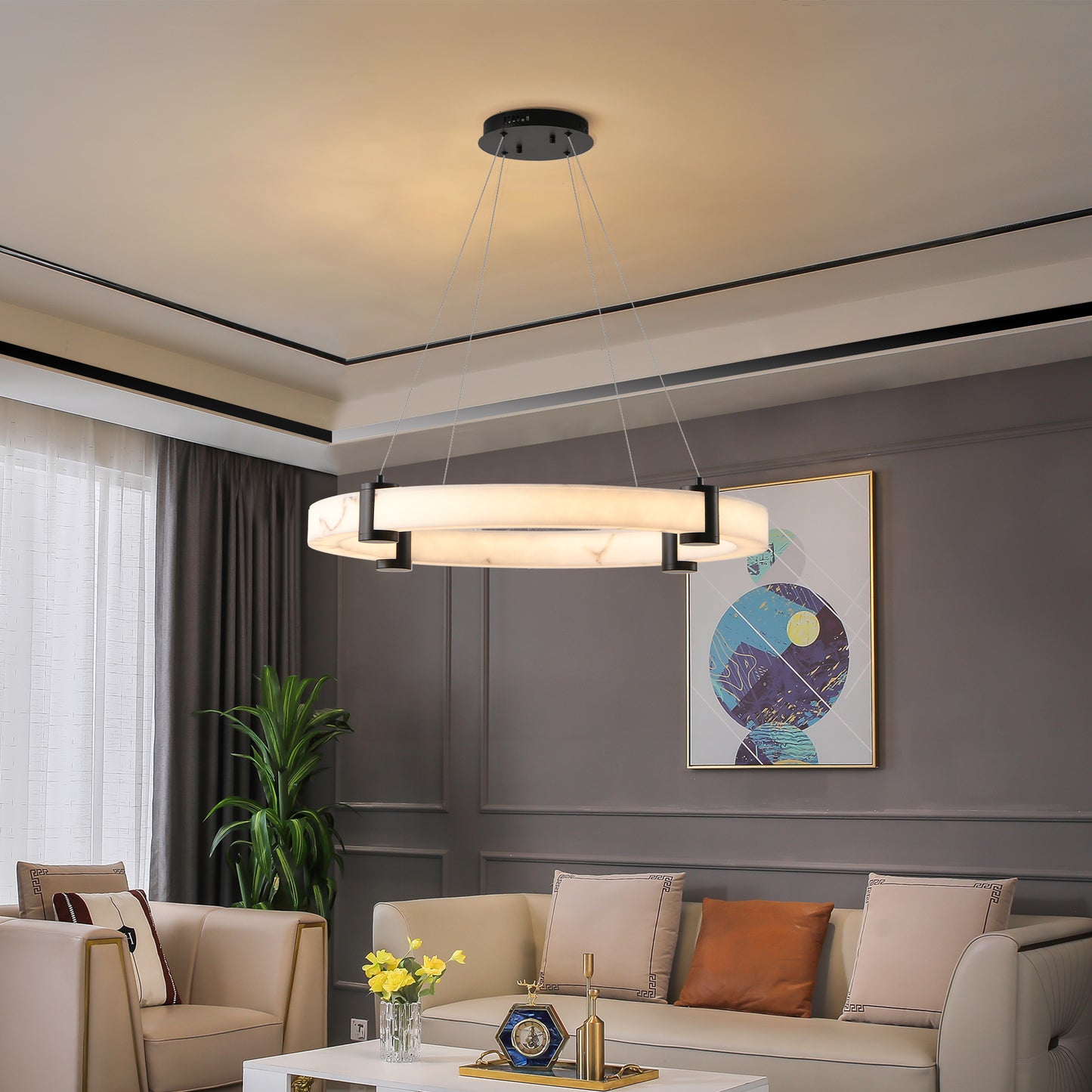 Modern round chandelier with faux marble finish and black accents perfect for dining rooms