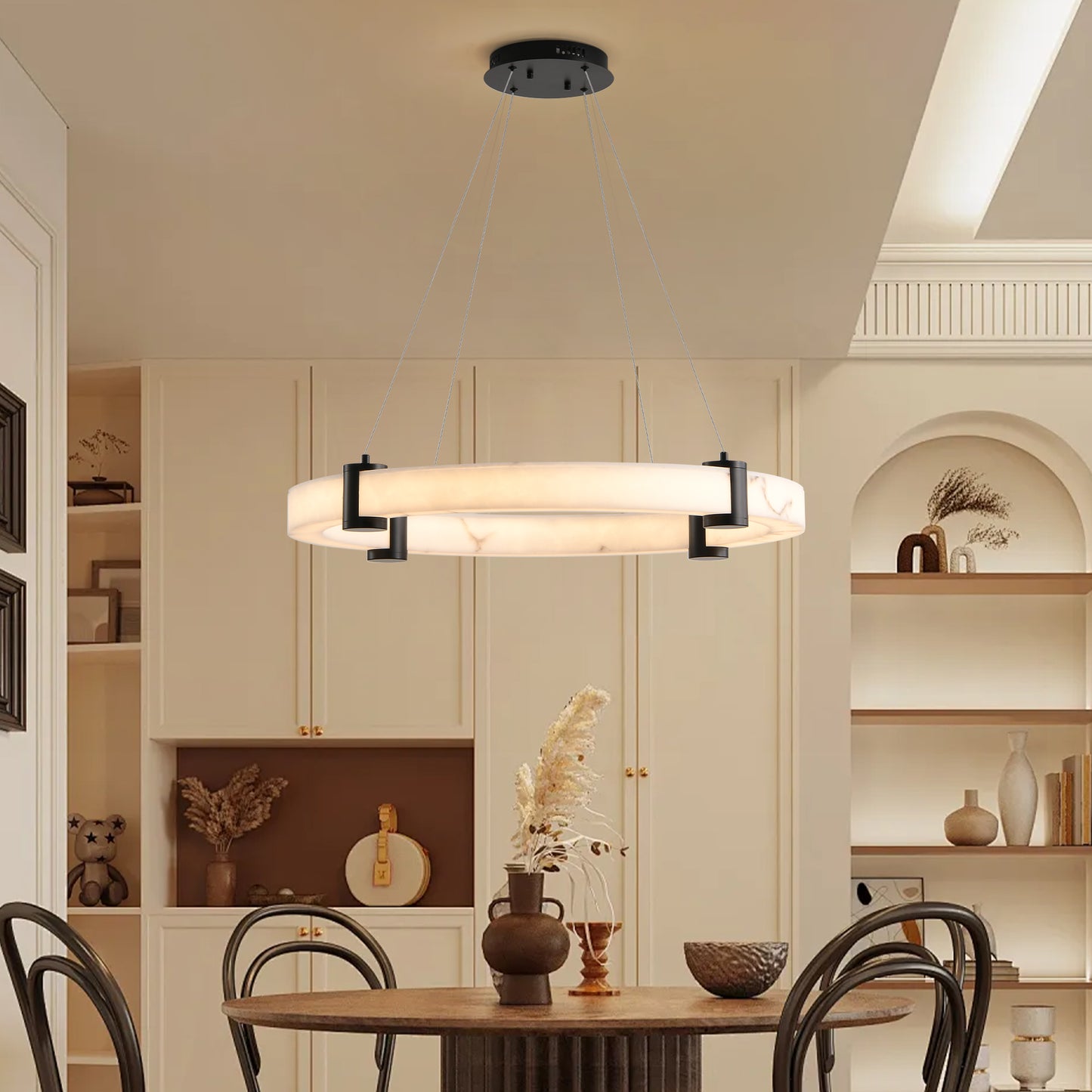 Modern circular Alabaster chandelier with black metal accents ideal for dining rooms