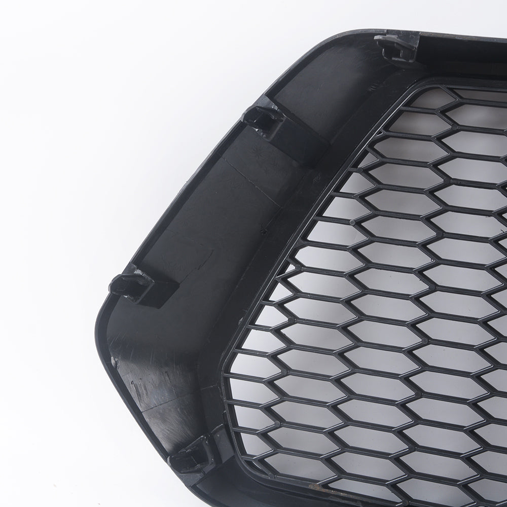 Black hexagonal grille insert for vehicle bumper with clip attachments