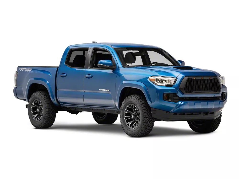 Blue Toyota Tacoma TRD Sport pickup truck with offroad tires
