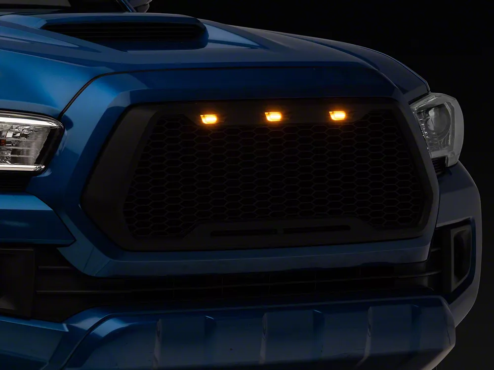 Blue truck grille with integrated amber LED accent lights for rugged style