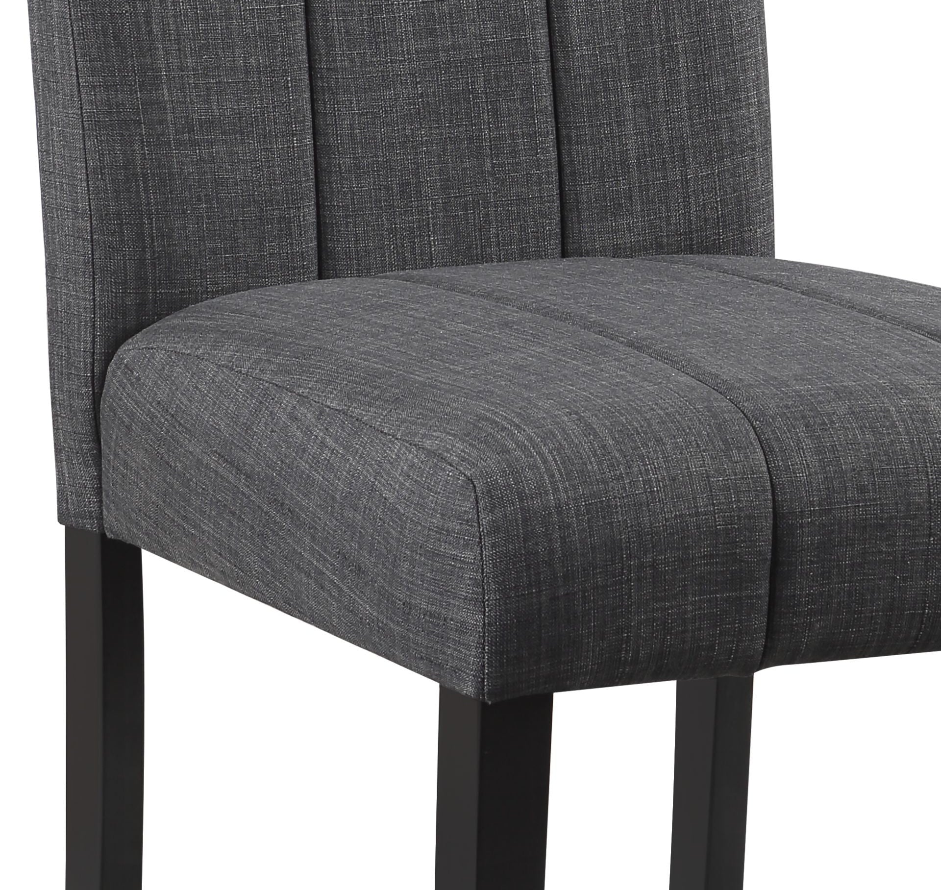 Dark grey upholstered dining chair with channeled back and seat