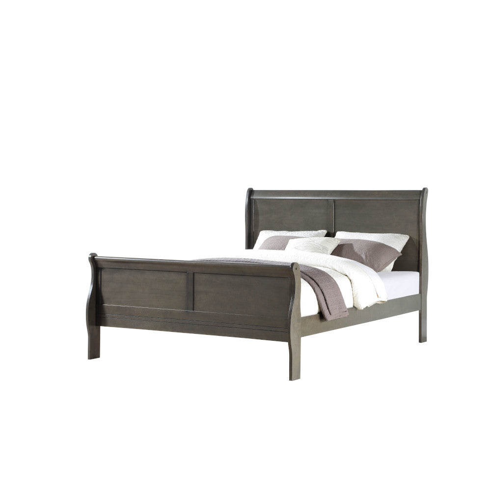 Dark gray sleigh bed with upholstered pillows