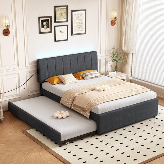 Dark grey upholstered platform bed with pullout trundle ideal for small spaces