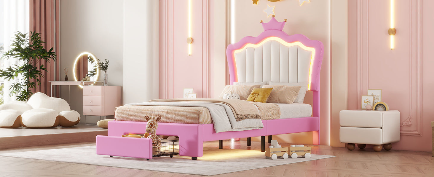 Pink upholstered twin bed with crown headboard and builtin drawer for a childs bedroom