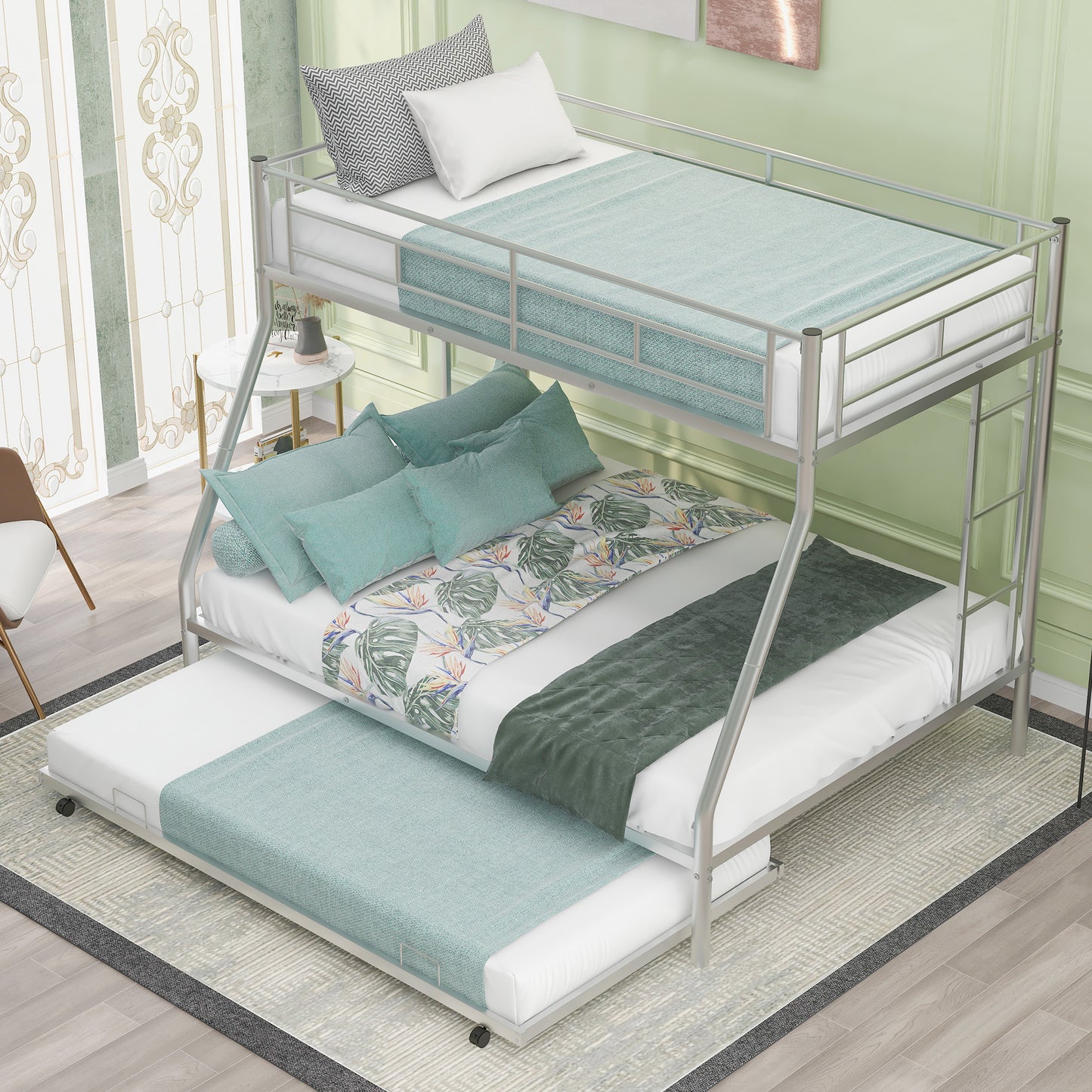 Silver metal triple bunk bed with teal bedding and tropical print accents