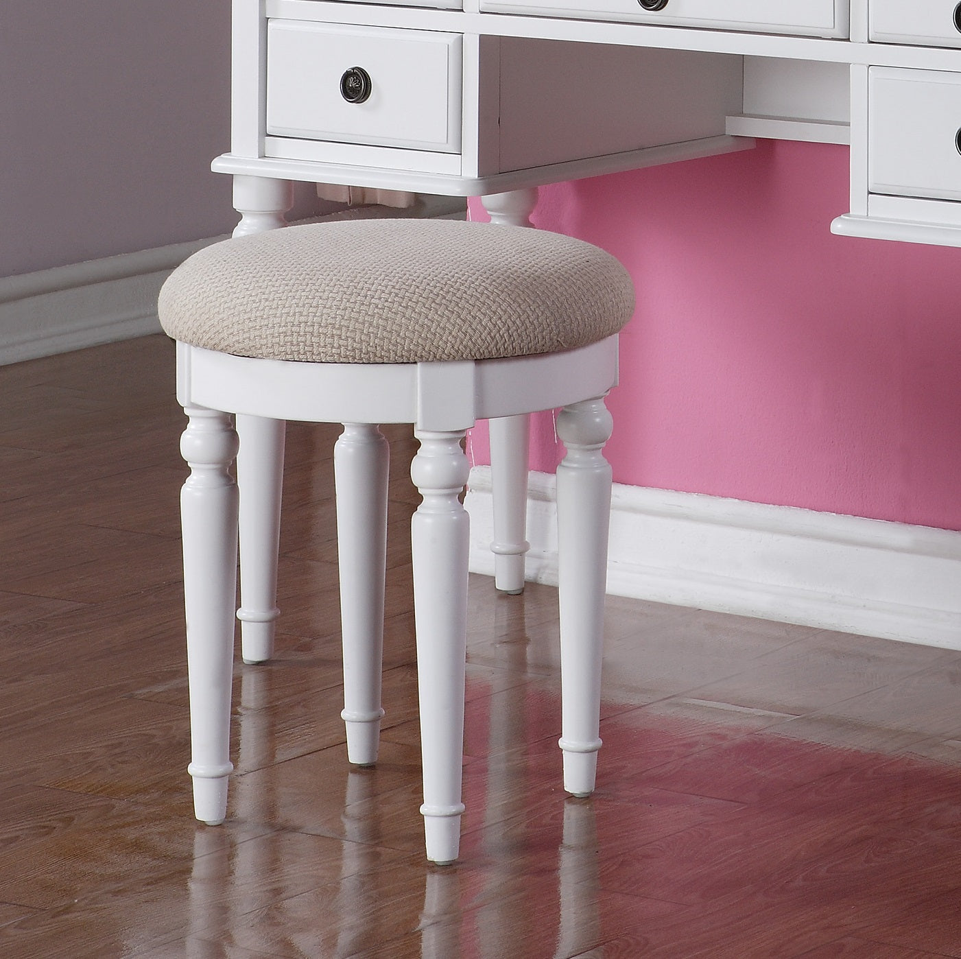 White vanity stool with upholstered beige seat
