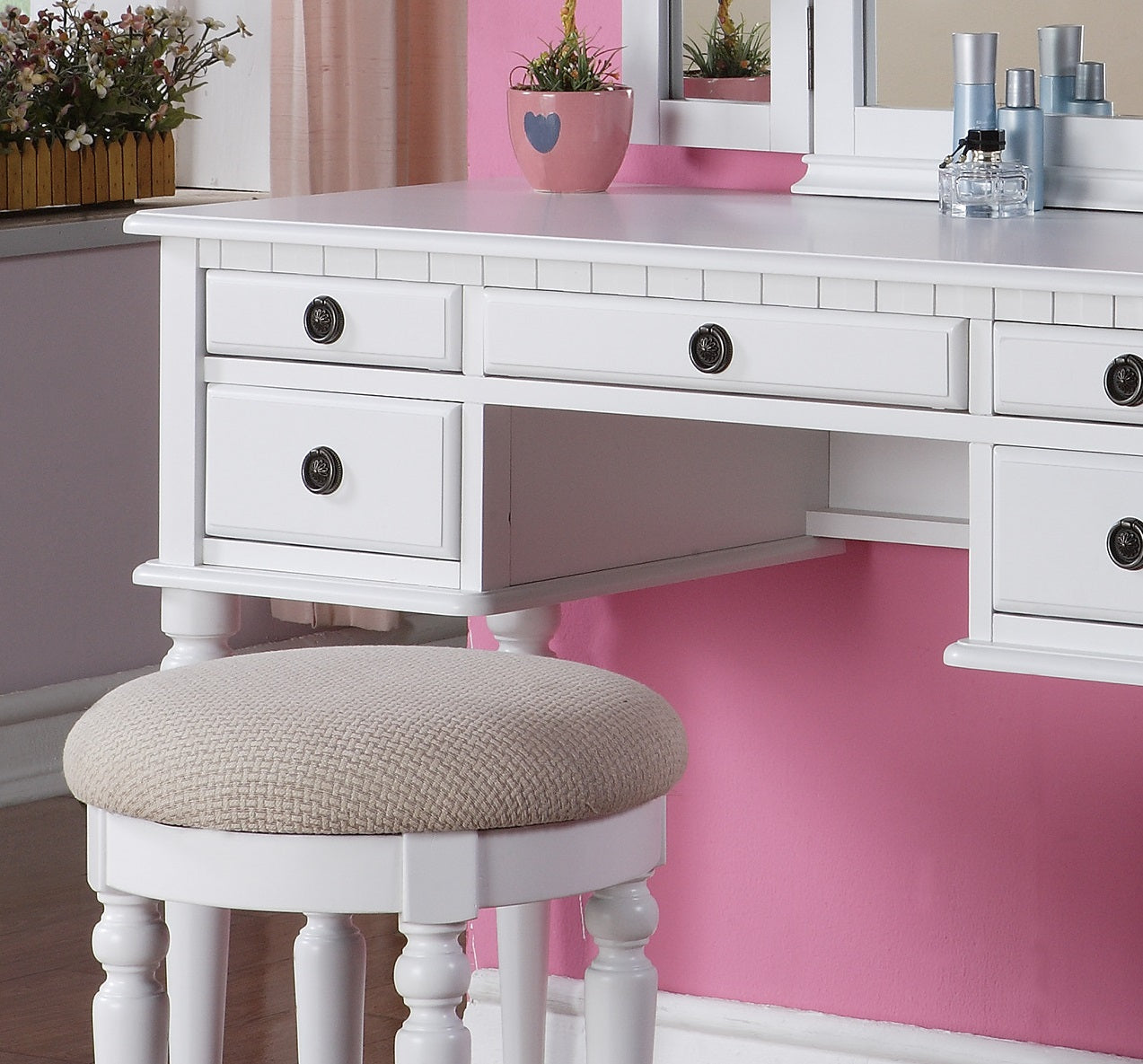 White vanity desk with antique brass knobs and matching stool