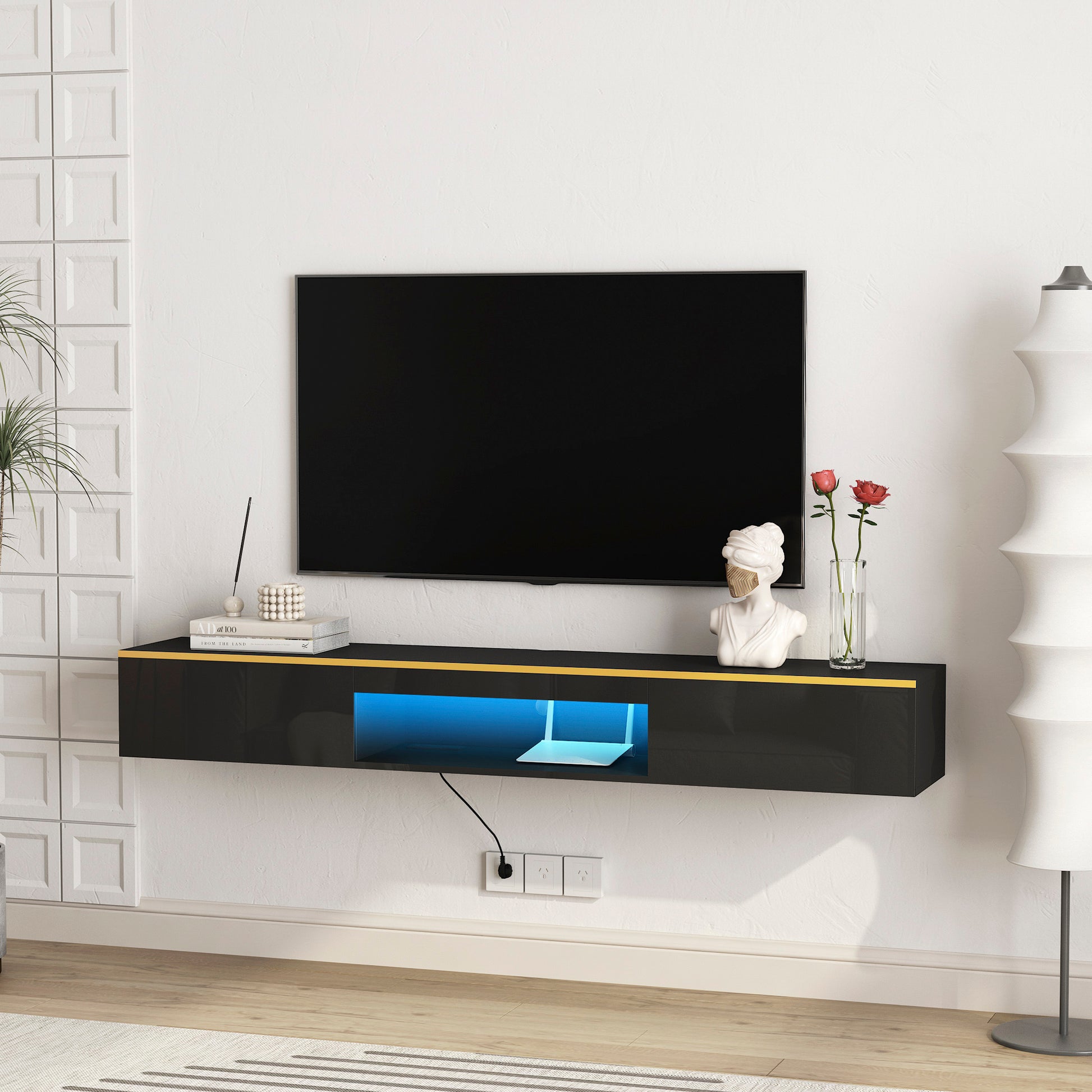 Black floating tv stand with yellow accent and blue LED lights