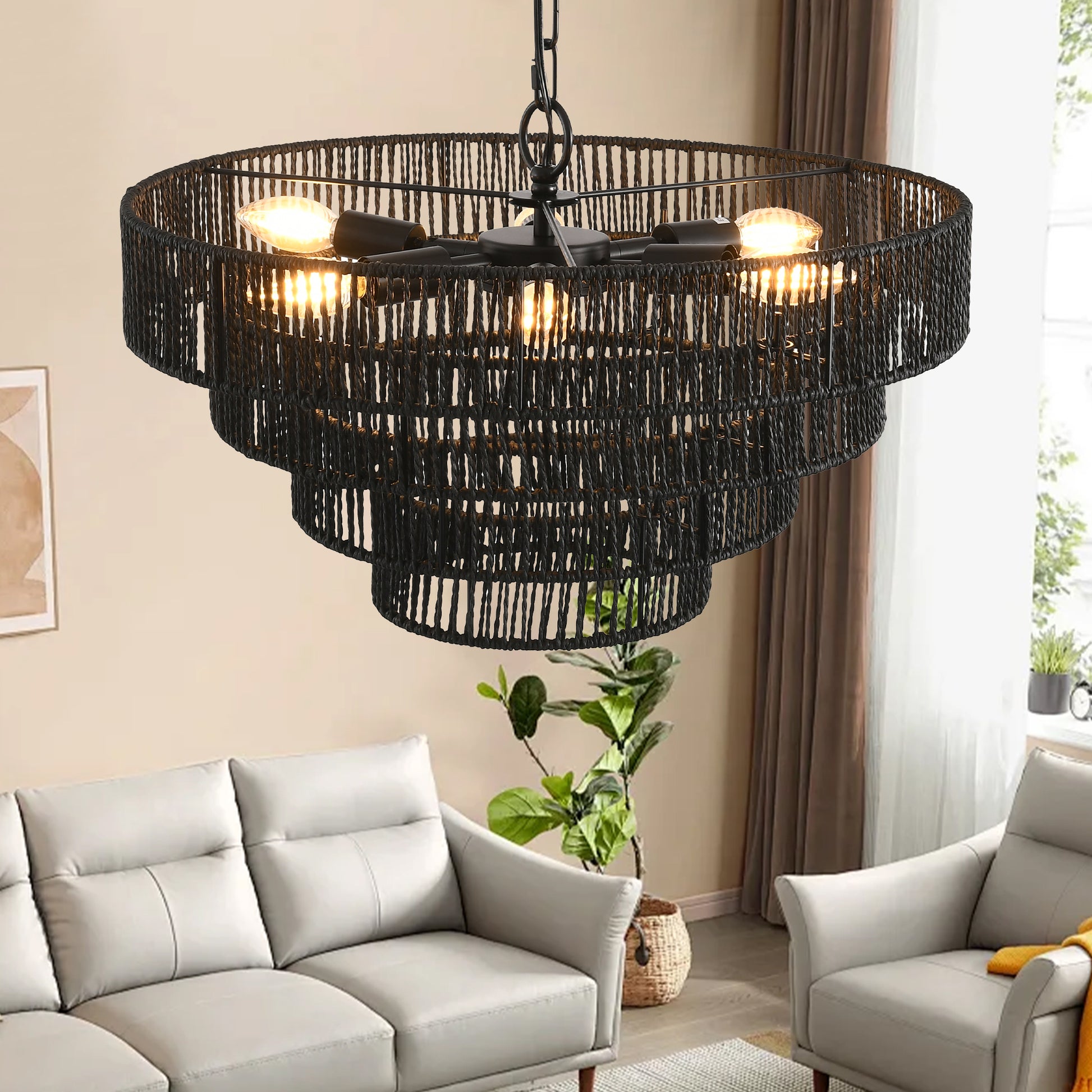 Black tiered rattan chandelier with visible Edison bulbs in a living room setting