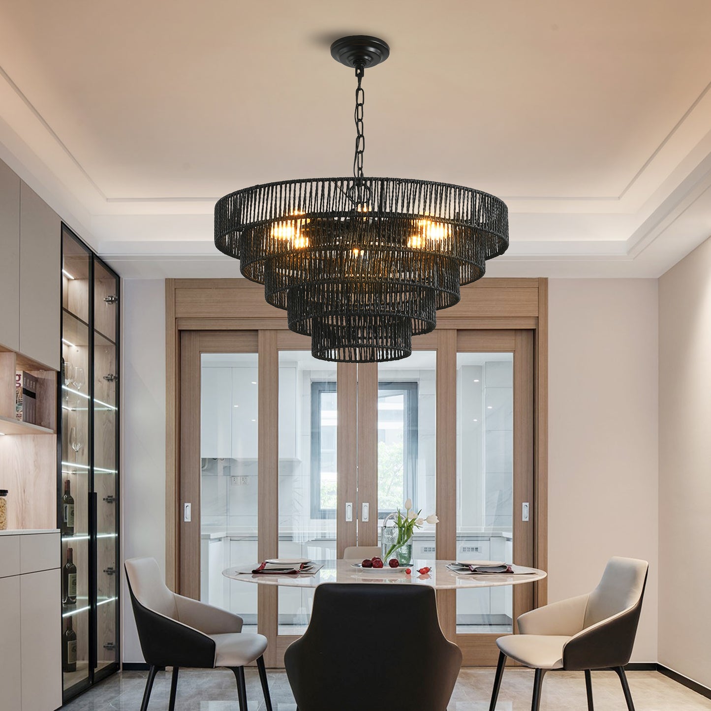 Black tiered pendant chandelier with natural rope accents perfect for dining rooms