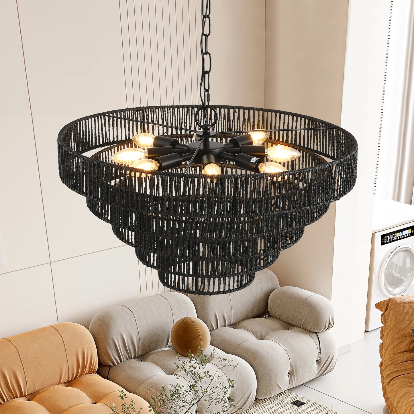 Tiered black rattan chandelier with exposed Edison bulbs provides ambient lighting