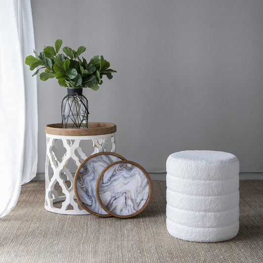 White textured round ottoman for living room accent seating