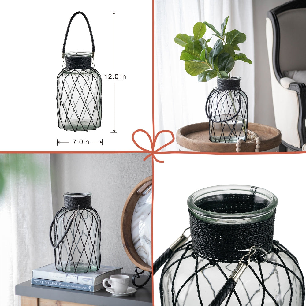 Clear glass lantern with black wire cage and handle