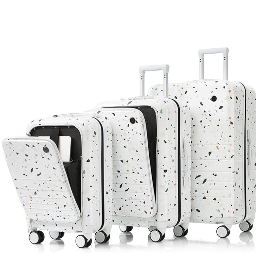Three white suitcases with terrazzo pattern varying sizes travel luggage