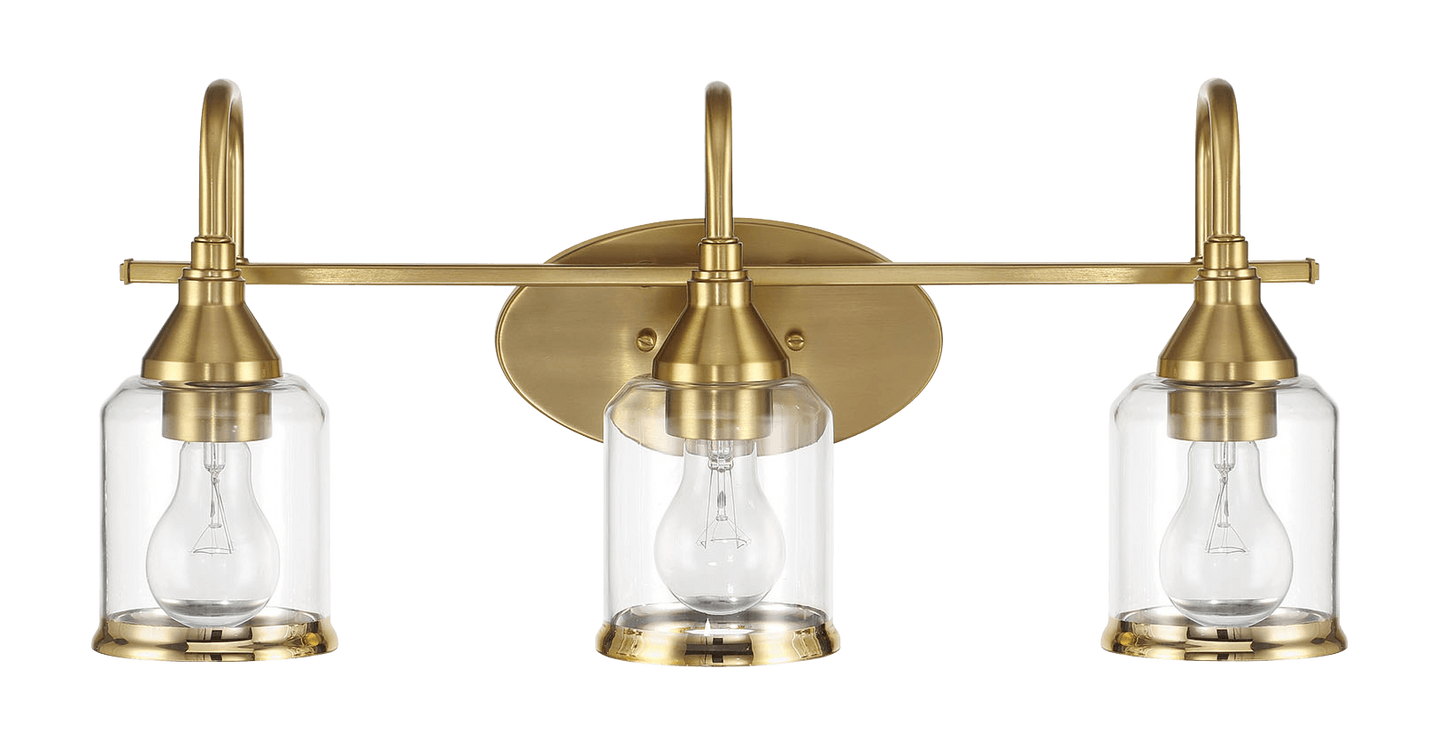 Threelight brushed brass vanity light with clear glass shades and exposed bulbs