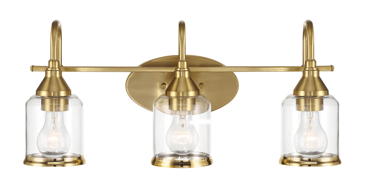 Threelight brass vanity light with clear glass shades and exposed Edison bulbs