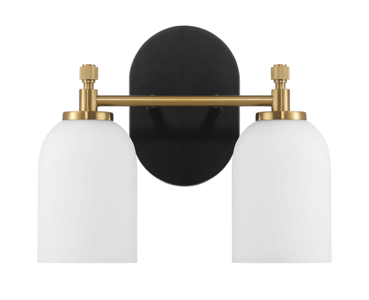 Modern brass and black double sconce with white glass shades for ambient lighting