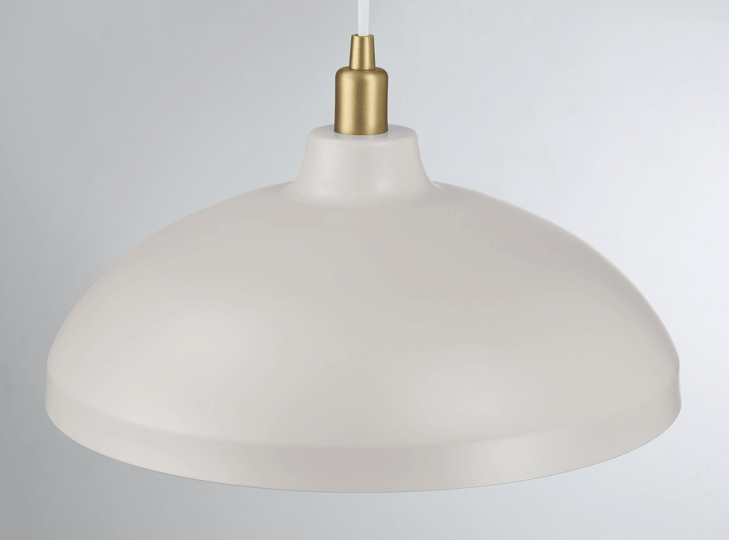 Cream farmhouse pendant light with brass accents ideal for kitchen island lighting