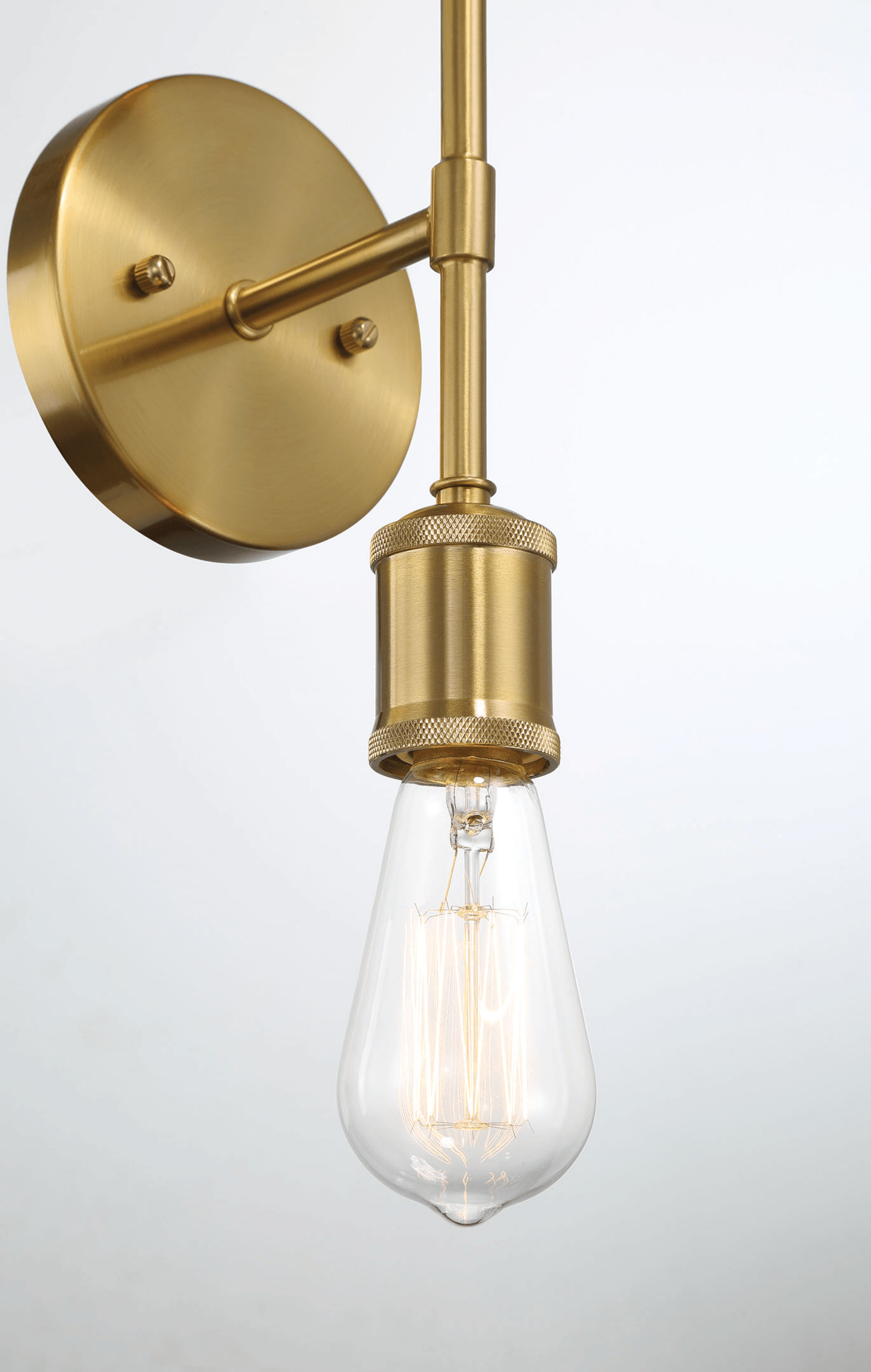 Brushed brass wall sconce with exposed filament Edison bulb modern design
