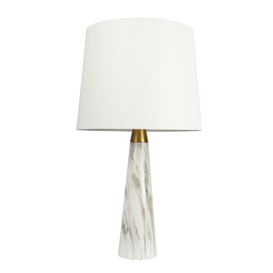 White linen drum shade table lamp with a tapered marble base and brass accent