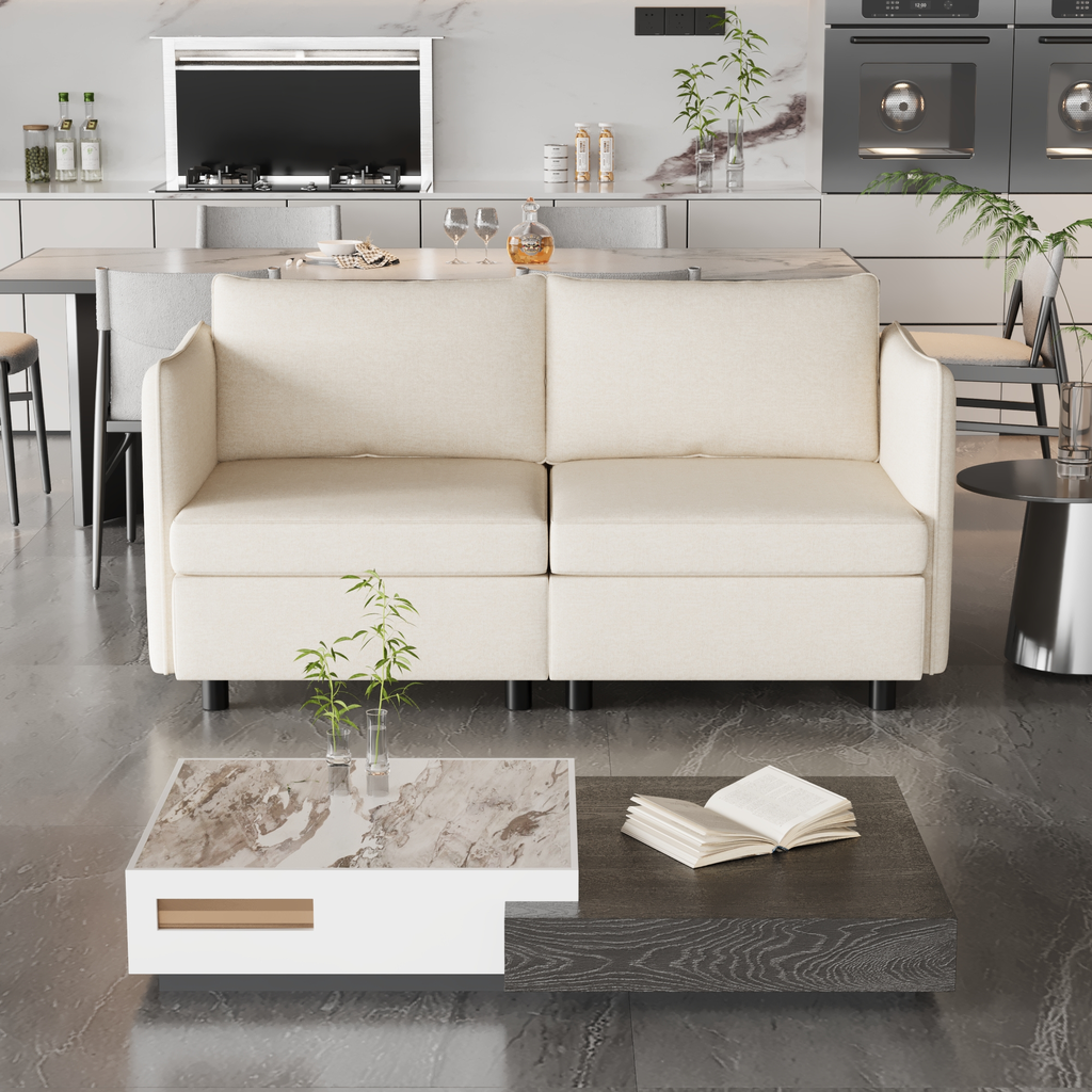 Cream fabric twoseater sofa with modern minimalist design in a bright living room