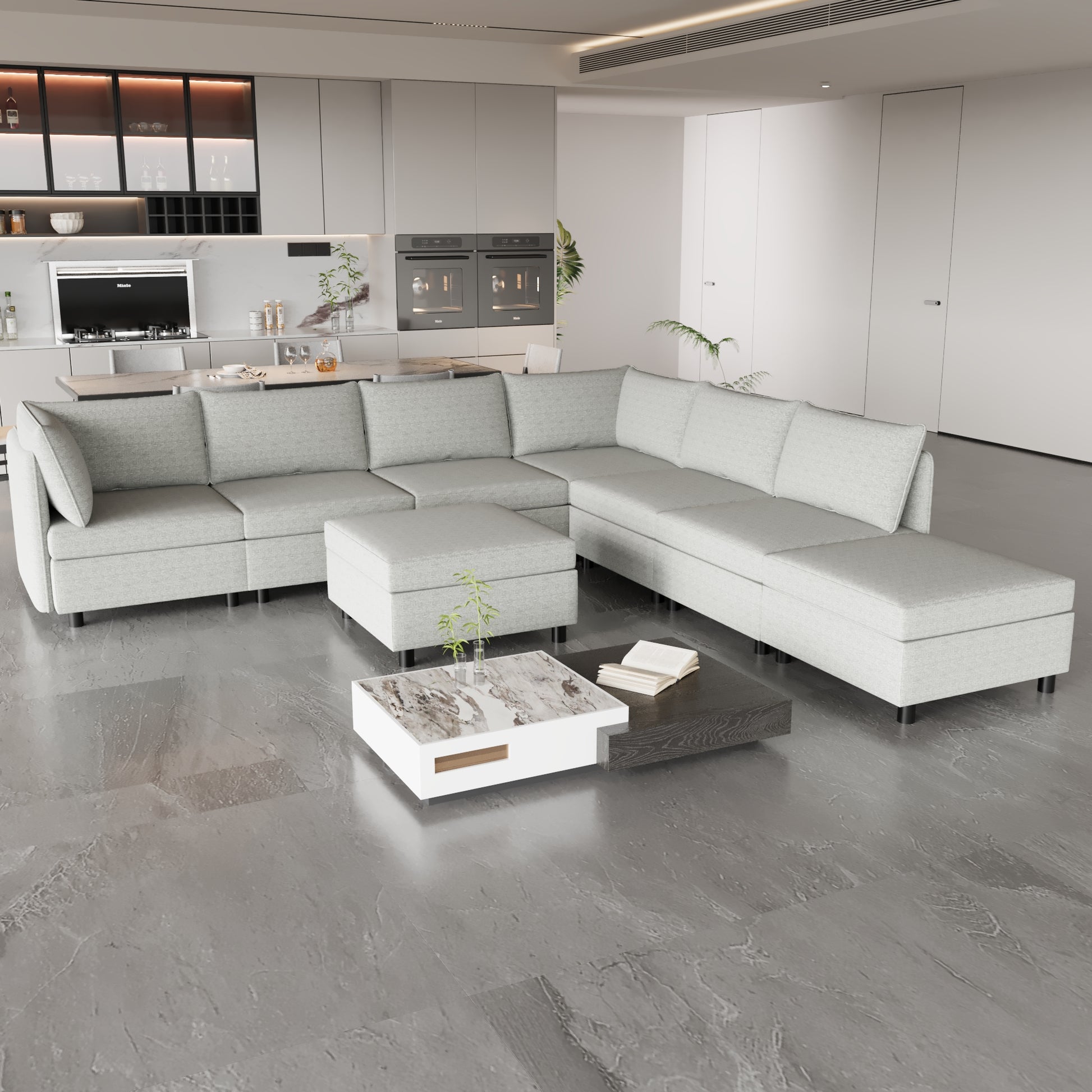 Light gray fabric sectional sofa with detached ottoman and modern coffee table
