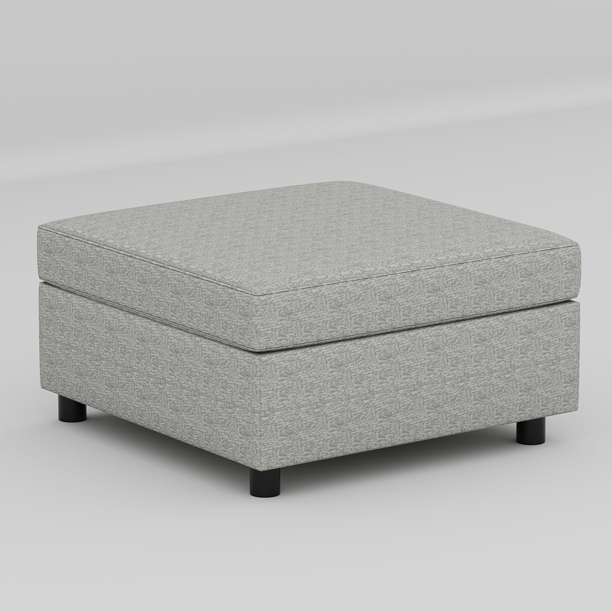 Square upholstered ottoman with gray geometric patterned fabric and short black legs