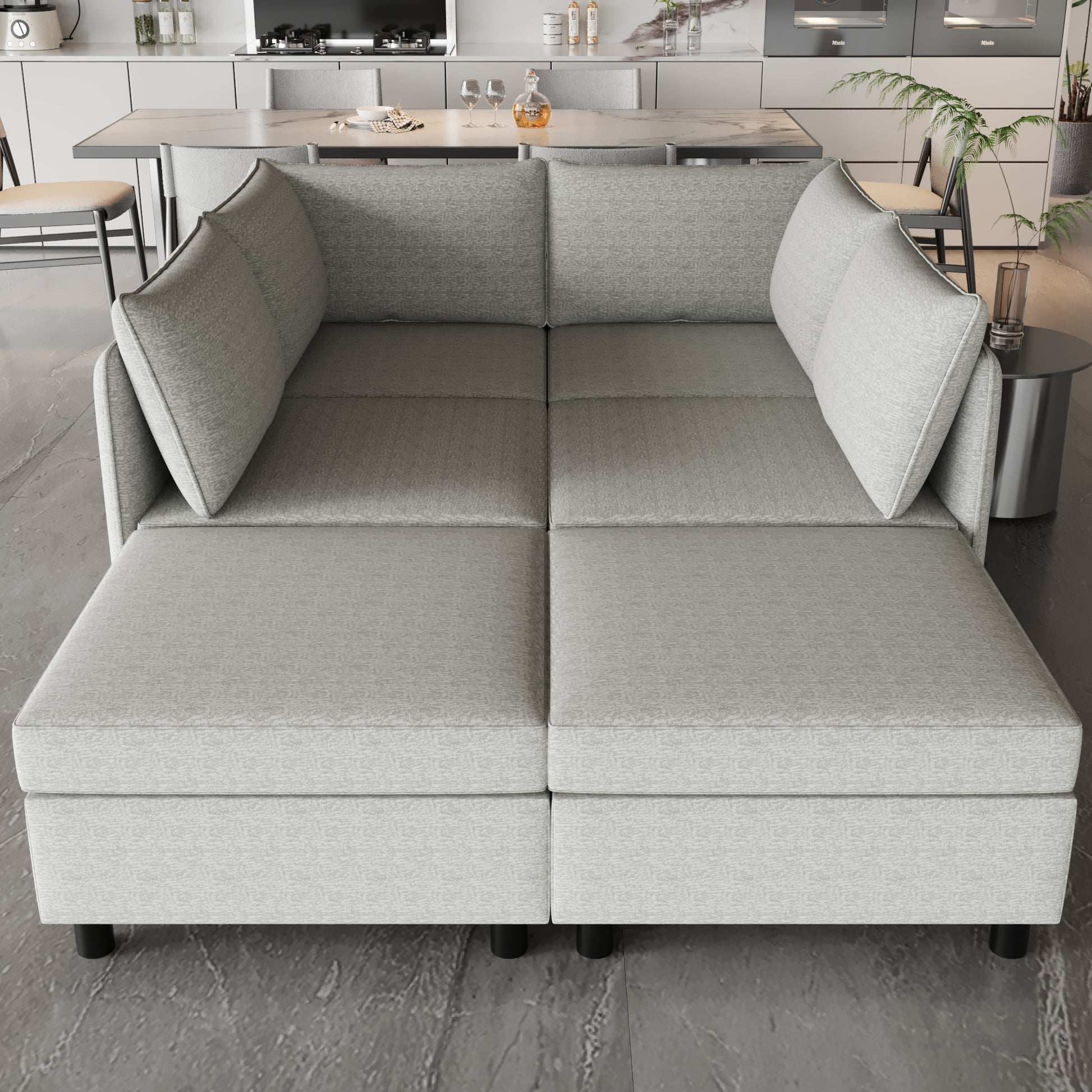 Light grey sectional sofa with plush cushions and reversible chaise lounge for modern living rooms