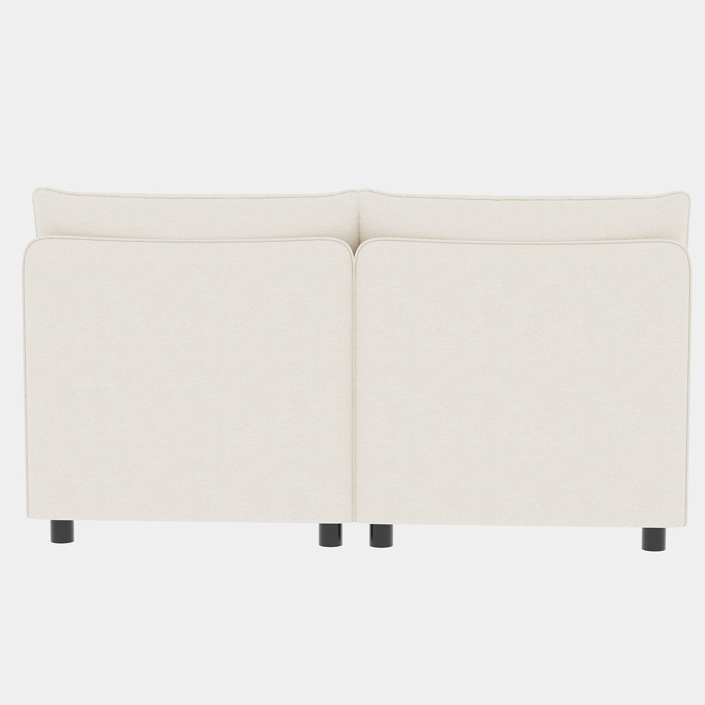 Cream upholstered sofa back with clean lines and black cylindrical legs